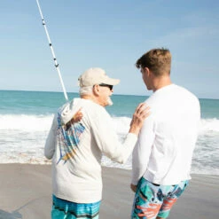 Ron Jon Sailfish Long Sleeve Hooded Sun Shirt -Ron Jon Surf Shop Sales d800x800 10480484001 white ron jon sailfish upf long sleeve hooded shirt lifestyle 2